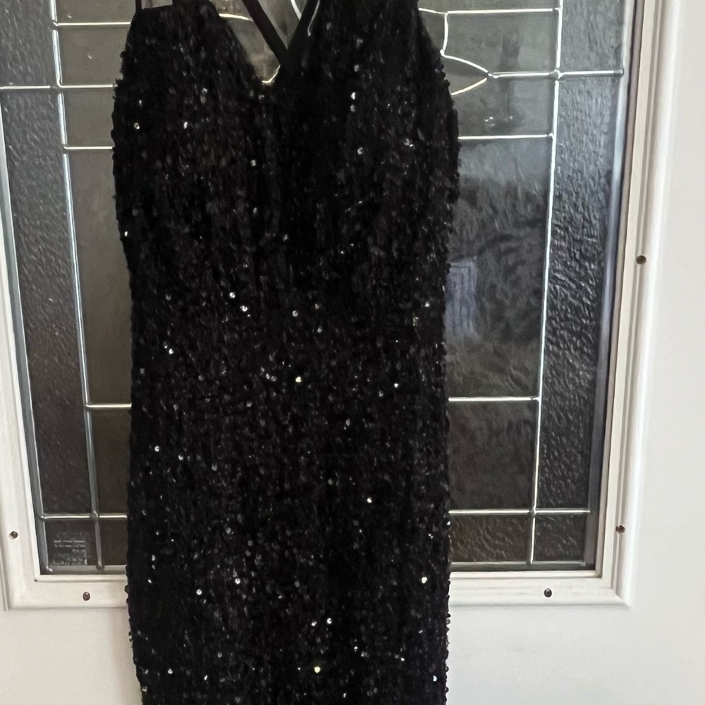 I am selling a prom dress from shein the size is small and color is black